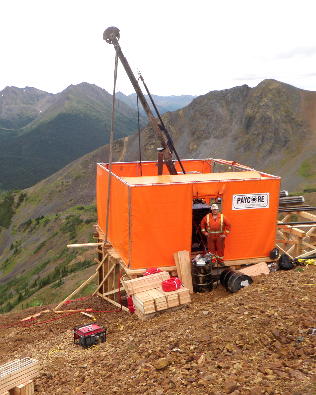 Heli shack with orange tarping on shack